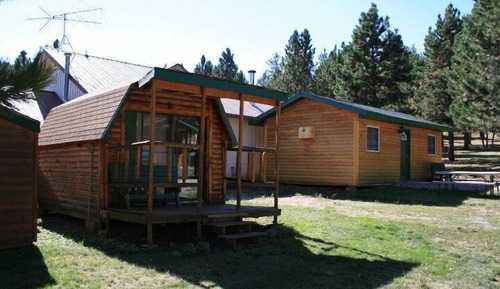 Economy Cabin, 1 Queen Bed, Refrigerator & Microwave (no bathroom in cabin, community bathroom)