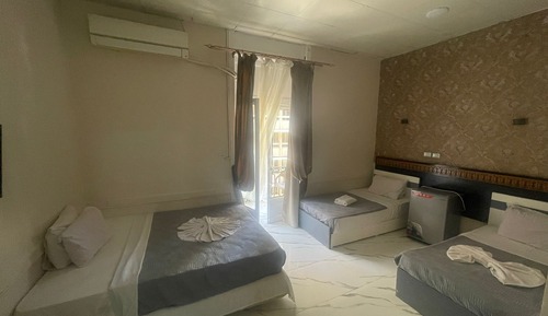 Deluxe Quadruple Room, City View
