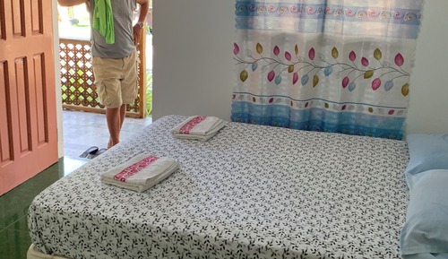 Basic Quadruple Room, Balcony, Garden View