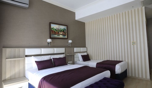 Family Quadruple Room, City View