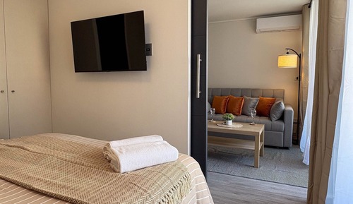 Superior Quadruple Room, 1 Double Bed with Sofa bed, Balcony, City View