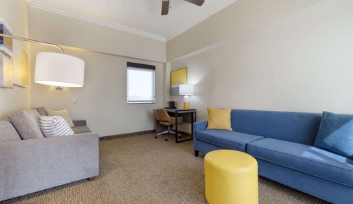Deluxe Suite, 2 Queen Beds, Sofa Bed, Living Room, Non Smoking