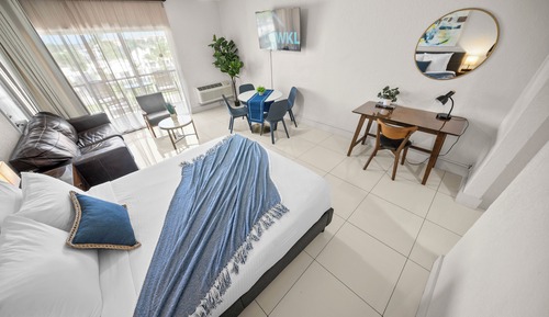 Superior Queen w/ Balcony, Kitchenette & Sofa Bed