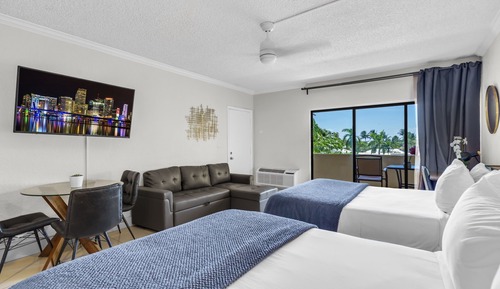 Superior Double Queen W/ Balcony & Sofa