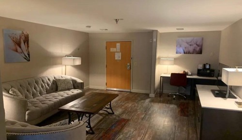 King suite-separate living area-shower only-partial mountain view-larger room