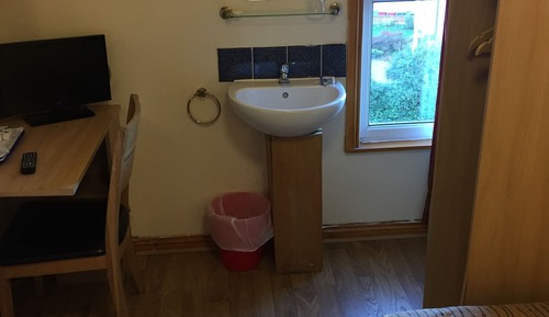 Basic Single Room, 1 Twin Bed, Shared Bathroom