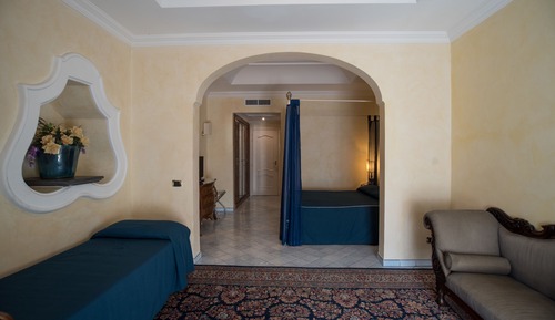 Deluxe Quadruple Room, Partial Sea View