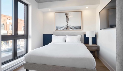 201 - 2nd Floor Office Suite, Queen Bed, Main St. View