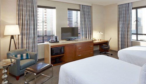 Two Queen beds with a City View