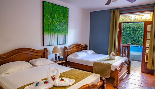 Deluxe Double Room, 2 Queen Beds, Partial Ocean View, Poolside