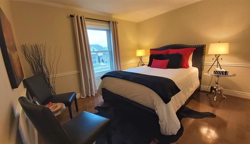 The Retreat, 1 Queen Bed, second floor, private bathroom across the hallway