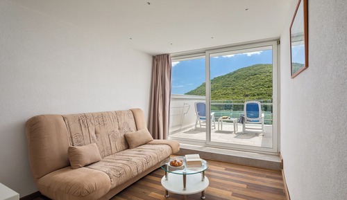 Standard Quadruple Room, Balcony, Partial Sea View