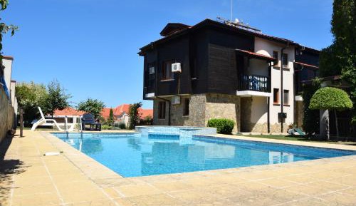 Three-Bedroom Villa with Balcony and Sea View