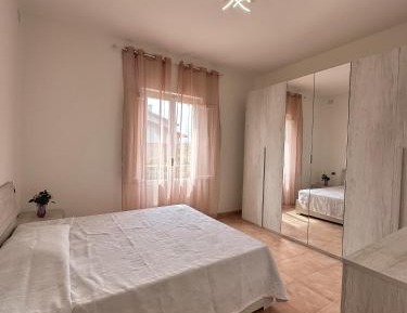 Three-Bedroom Apartment with Balcony