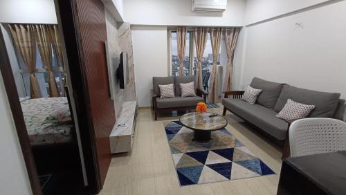 One-Bedroom Apartment with Balcony and City View