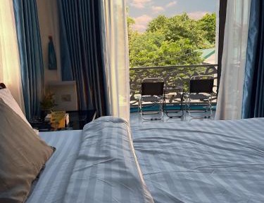 Double Room with Balcony (2 Adults + 1 Child)