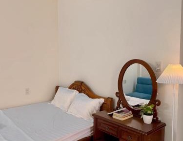 Queen Room with Shared Bathroom