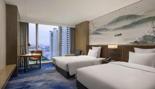 Deluxe Family Room with One King Bed and One Single Bed