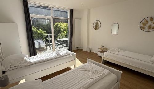 Four-Bedroom Apartment with Balcony 
