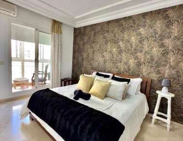 Three-Bedroom Apartment with Balcony