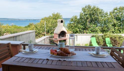 One-Bedroom Apartment with Balcony and Sea View