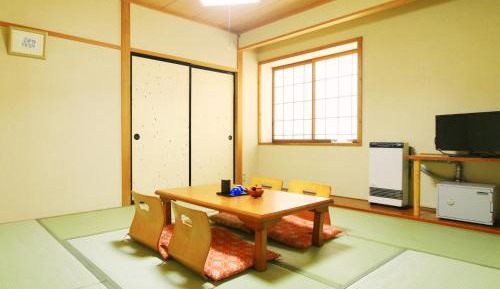 Quadruple Room with Shared Bathroom