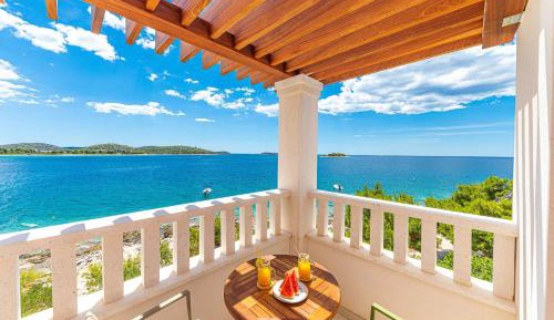 One-Bedroom Apartment with Balcony and Sea View