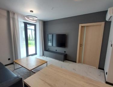 Deluxe One-Bedroom Apartment with Garden View