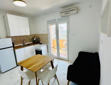 Two-Bedroom Apartment with Balcony and Sea View