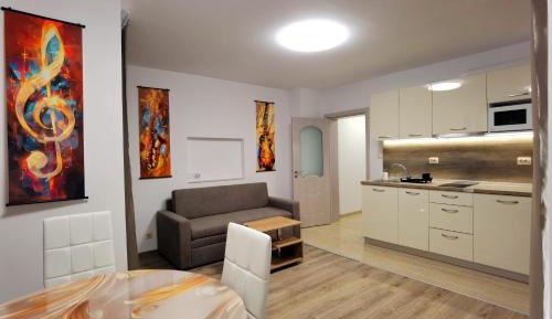 One-Bedroom Apartment with Balcony and Sea View