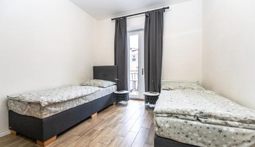 Two-Bedroom Apartment with Balcony