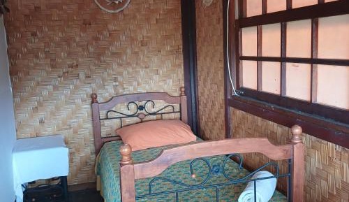 Single Bed in Dormitory Room