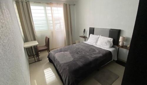 Standard Double Room with Shared Bathroom