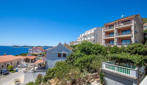 One-Bedroom Apartment with Balcony and Sea View