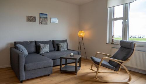 One-Bedroom Apartment with Sea View and Balcony