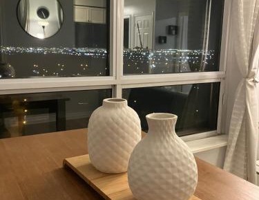 One-Bedroom Apartment with Balcony and City View