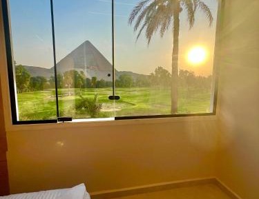 Superior Triple Room with pyramids view