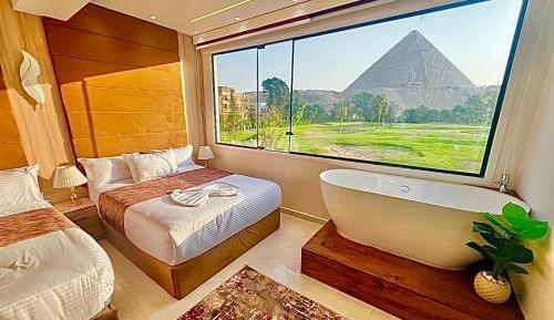 Quadruple Room with pyramids view