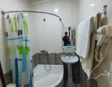Quadruple Room with Private Bathroom