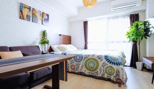 One-Bedroom Apartment with Balcony and City View