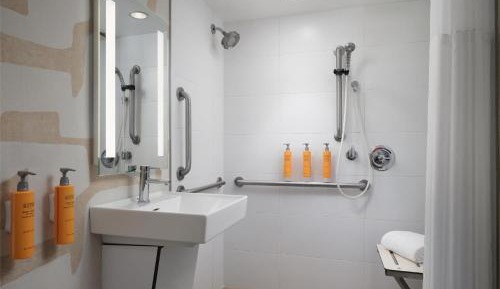 Mobility Accessible One Bedroom Suite King Roll-In Shower