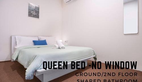 Queen Room with Shared Bathroom