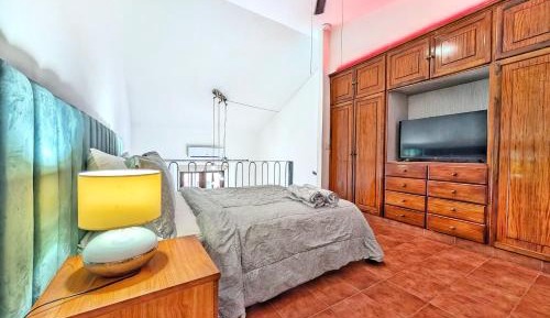 One-Bedroom Apartment with Balcony and City View