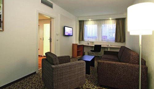 Standard Suite with 1 double bed and 2 sofas