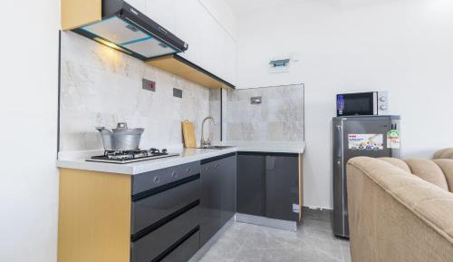 One-Bedroom Apartment with Balcony and City View