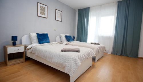 Three-Bedroom Apartment with Balcony