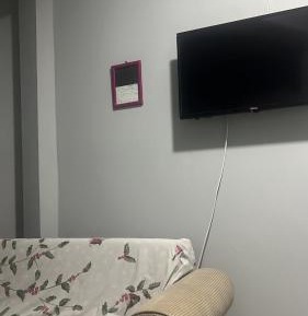 Single Bed in Dormitory Room