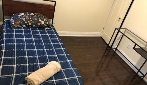 Single Bed in Dormitory Room