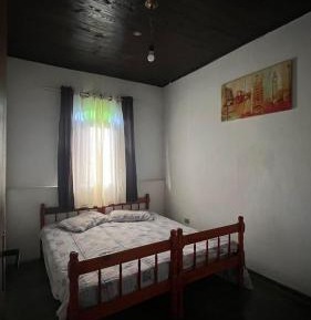 Standard Double Room with Shared Bathroom