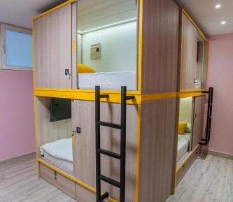 Single Bed in Dormitory Room